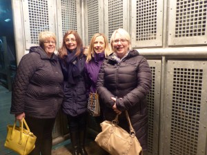 Waiting for our first trip on the 'L' keeping warm